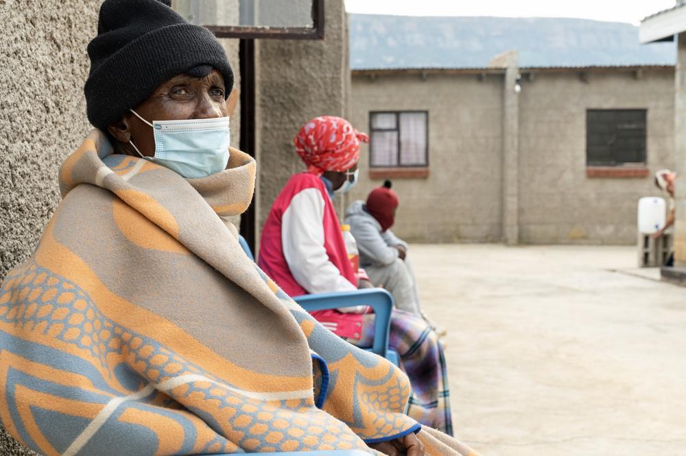 PIH nurse Seabata Ntsibane administers treatment to MDR-TB patient Khamokha Khamokha.
