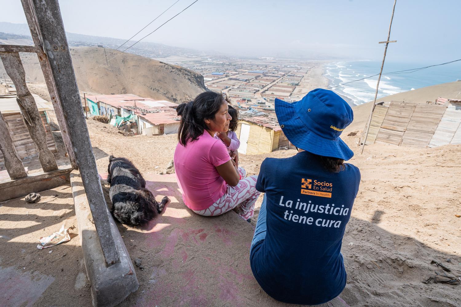 CHW with patients in Peru.