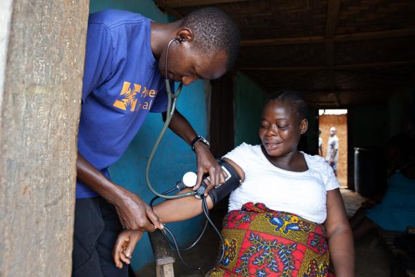 A health worker attends to a pregnant woman