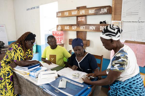 Staff and patient at Edith Wallace Health Center