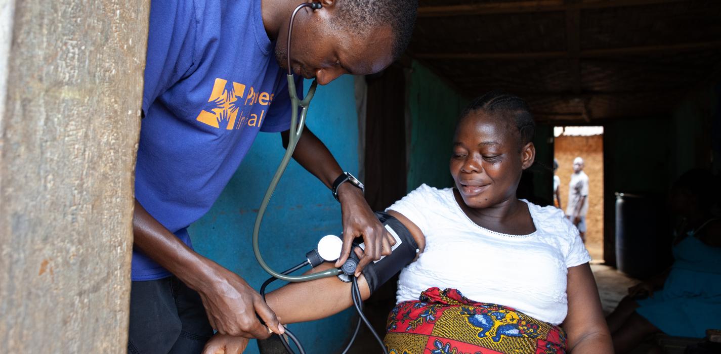 A health worker attends to a pregnant woman