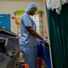 A health worker attends to an adolescent at youth-friendly center