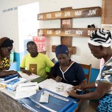 Staff and patient at Edith Wallace Health Center